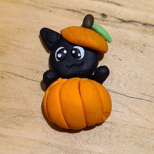 19 clay cat in Halloween pumpkin