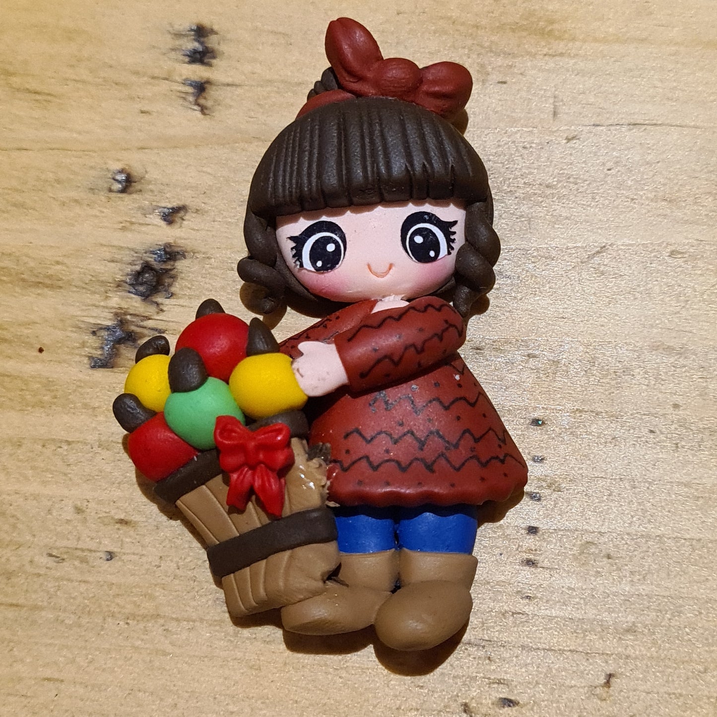 35 clay girl with basket