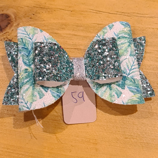 59 - Bow on clip leaves and glitter